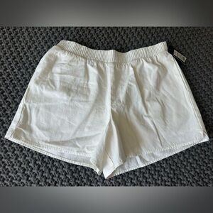 NWT Simple, white elastic waist shorts with pockets